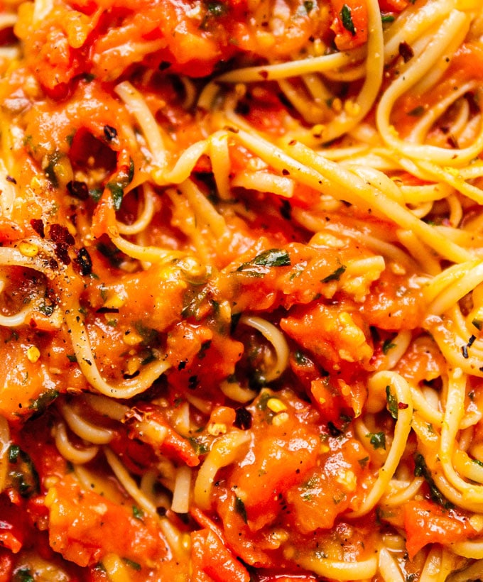 Homemade marinara sauce mixed with spaghetti
