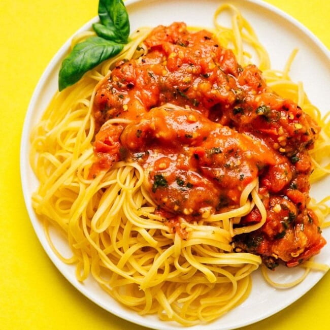 Homemade marinara sauce recipe on a plate of spaghetti