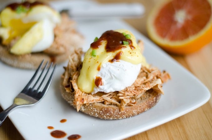 This Southern Eggs Benedict is has a southern BBQ twist on the delicious classic, with shredded BBQ chicken, homemade Hollandaise, and a poached egg.