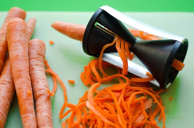 Spiralizing carrot noodles photo