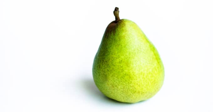 Comice pear on a white background