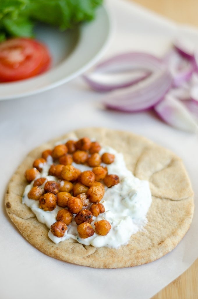 Roasted chickpea gyros with tomato and lettuce in a pita wrap