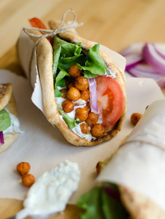 Roasted chickpea gyros with tomato and lettuce in a pita wrap