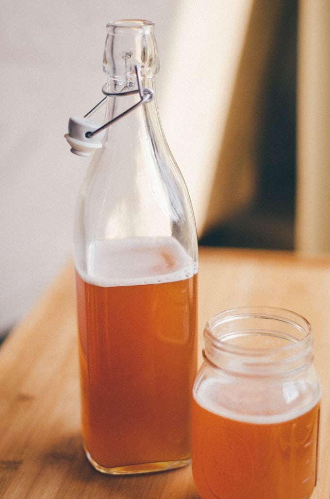 How to make easy homemade kombucha, the fizzy fermented tea, with just 4 ingredients! All you need is black tea, sugar, water, and starter tea.