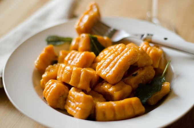 This Sweet Potato and Pumpkin Gnocchi is an autumn-inspired take on gnocchi. Fluffy, tender, and melt in your mouth with a creamy sage sauce.