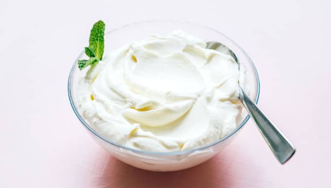 Greek yogurt in a bowl with mind
