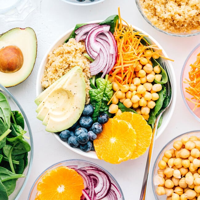 Buddha bowl recipe with fruits and veggies in a bowl