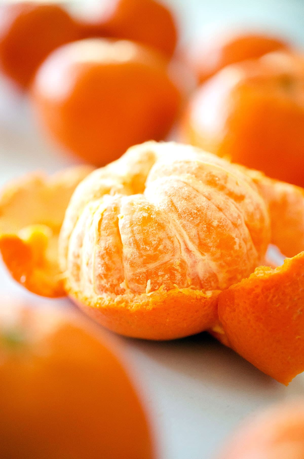 Close-up photo of a mandarin orange peeled.