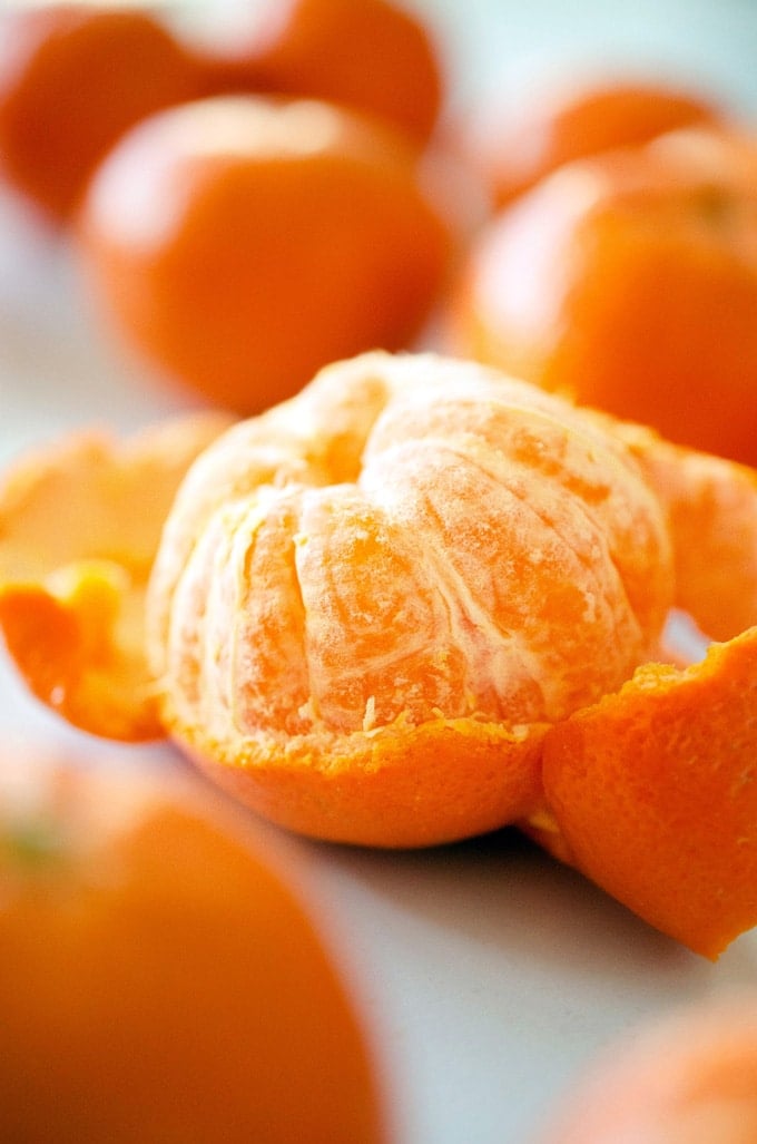 Close-up photo of a mandarin orange peeled.