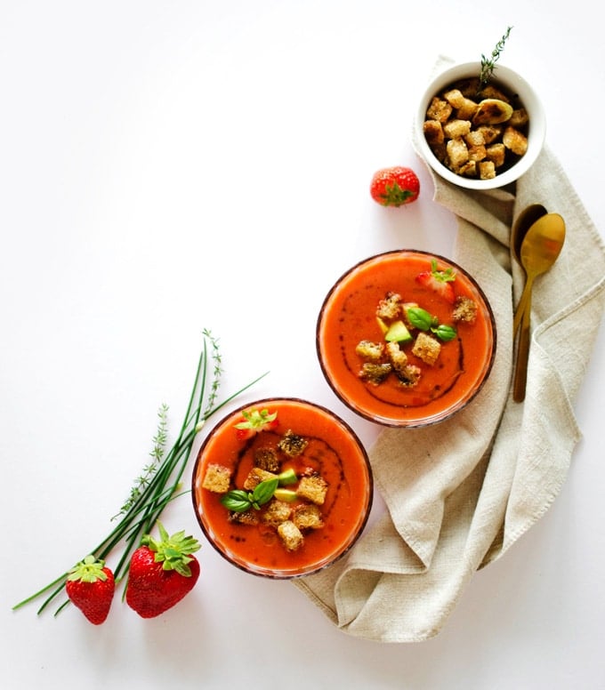 This savory Strawberry Gazpacho Soup is a light and refreshing cold soup with cucumbers, onion, and roasted red pepper that will keep you cool this summer!