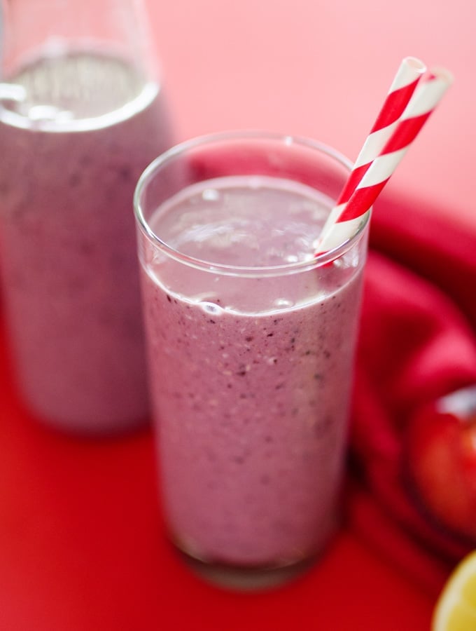 Berry Plum Cobbler Smoothie with straws in a glass