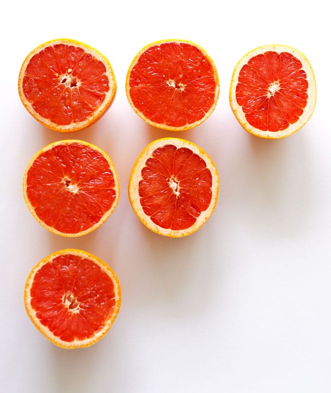 Grapefruit halves on a white background