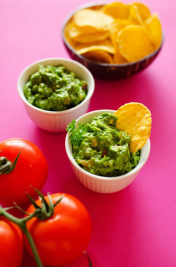 This Hidden Spinach Healthy Guacamole tastes like the homemade guacamole you know and love, but with the addition of vitamin-packed, vibrantly green spinach! Serve it as a chip dip, slather it onto tacos, or use it as a healthy toast topper.