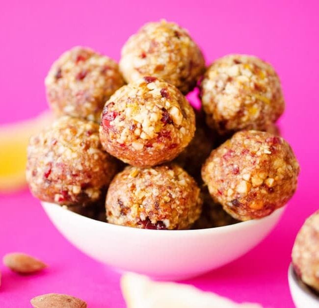 These Cranberry Bliss No Bake Energy Bites can be made in just 5 minutes and with all easy to find, natural ingredients. Sweet, zingy, and so addictive!