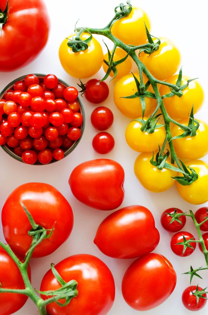 Everything you need to know about the many types of tomatoes! From heirlooms to hybrids, we're covering the cooking with tomatoes basics.