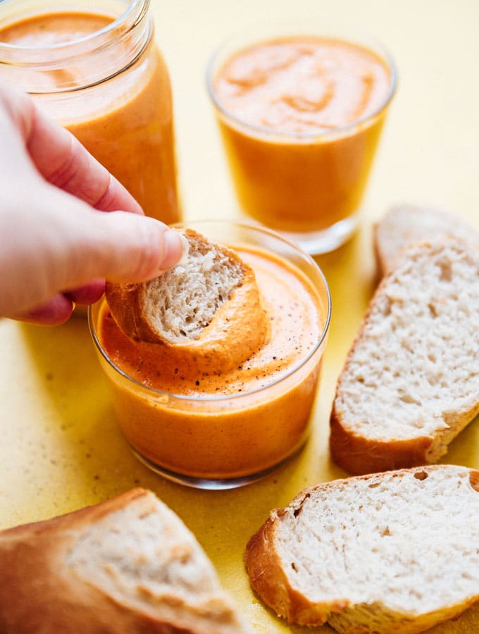 Romesco sauce recipe photo in a jar dipping bread
