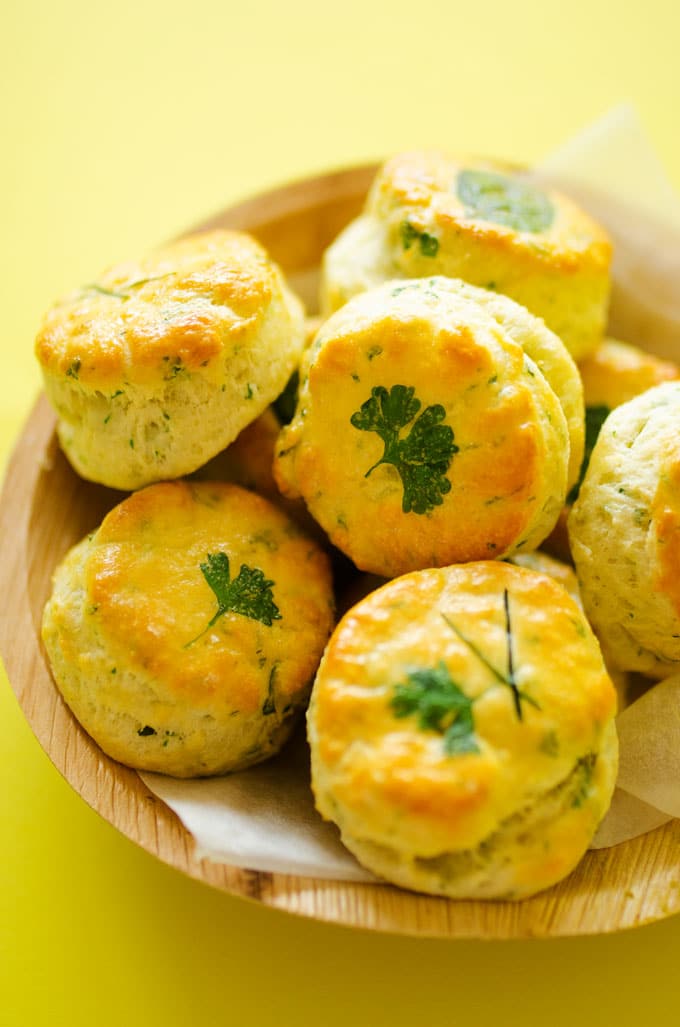 These Herby Greek Yogurt Biscuits are ultra-flaky with unique and delicious laminated herbs on top!