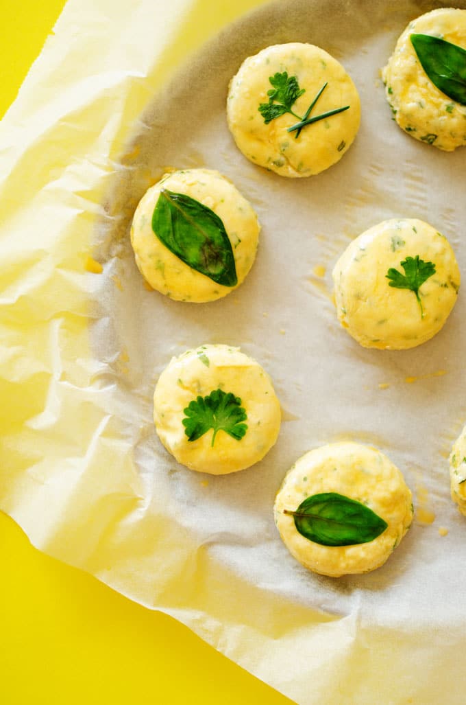 These Herby Greek Yogurt Biscuits are ultra-flaky with unique and delicious laminated herbs on top!