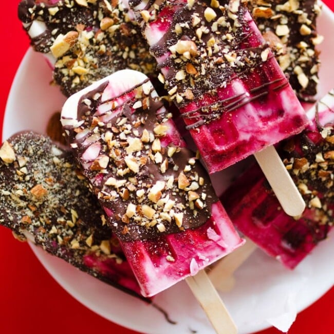 These Chocolate Covered Cherry Yogurt Popsicles are an easy-to-make, healthy, and tasty treat to make this summer. If you need a reason to finally break out that old popsicle mold, this is it.