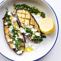 With fresh mint sauce and feta cheese, this roasted eggplant is a flavorful hands-off dish to make tonight!