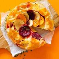 This Savory Apple Tart is a colorful, easy, and flavorful, dish with potatoes, beets, and apples in a flaky phyllo crust. It's sweet, it's savory, and it's calling your name.