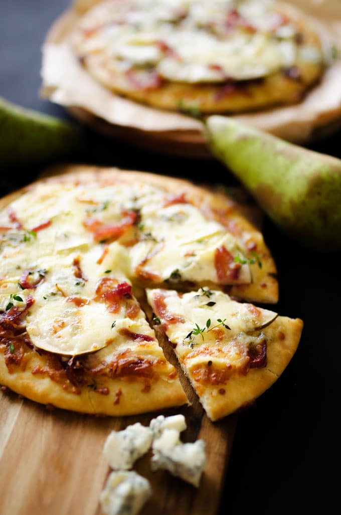 This Gorgonzola Pear Pizza is loaded with autumn flavor...caramelized onions, thyme, brie, the works!