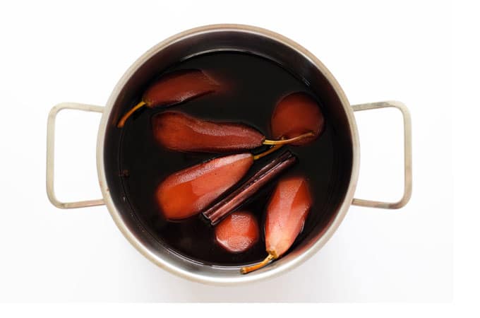 These Dutch Poached Pears (or "stoofpeertjes" as they call them here in the Netherlands) are a delicious wintertime classic. Just stew peeled pears in wine and spices for a half hour and serve!