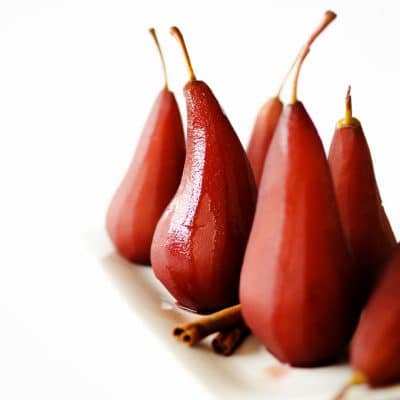 These Dutch Poached Pears (or "stoofpeertjes" as they call them here in the Netherlands) are a delicious wintertime classic. Just stew peeled pears in wine and spices for a half hour and serve!