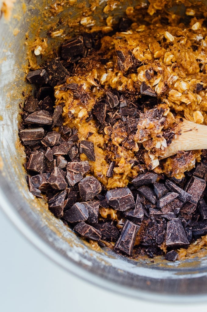 Chocolate chip cookie dough in a mixing bowl - Need a healthy cookie recipe that's just as moist and delicious as your old favorites? This Sweet Potato Cookie recipe with chocolate and oats has you covered.