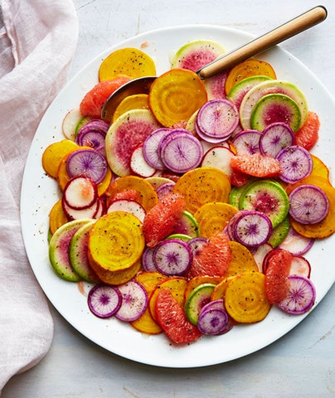 beet grapefruit and radish salat on a bowl from overhead - These radish recipes are simple and delicious (and best of all, they'll make you actually WANT to eat your veggies!) Give them a try for a colorfully peppery crunch.