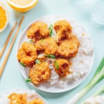 Orange cauliflower on a white plate.