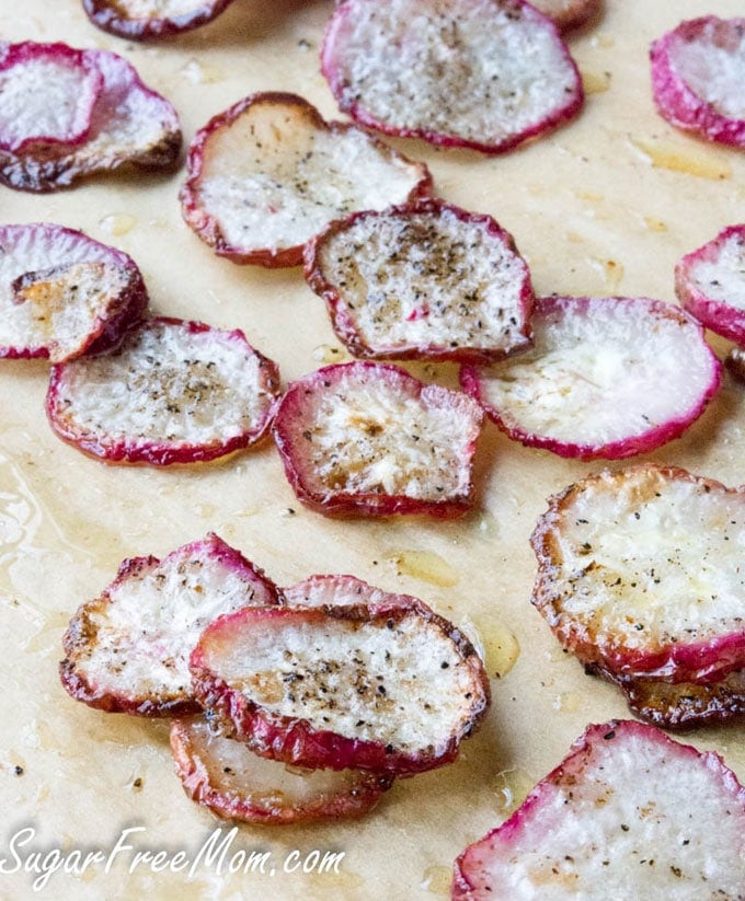 radish chips on a baking sheet - These radish recipes are simple and delicious (and best of all, they'll make you actually WANT to eat your veggies!) Give them a try for a colorfully peppery crunch.