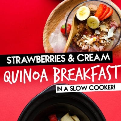 Quinoa in a clear bowl on a red background with wooden spoons - This Overnight Quinoa Breakfast Porridge is a delicious excuse to break out your slow cooker. It tastes like strawberries and cream (while being a healthy, protein-packed way to start your day!)
