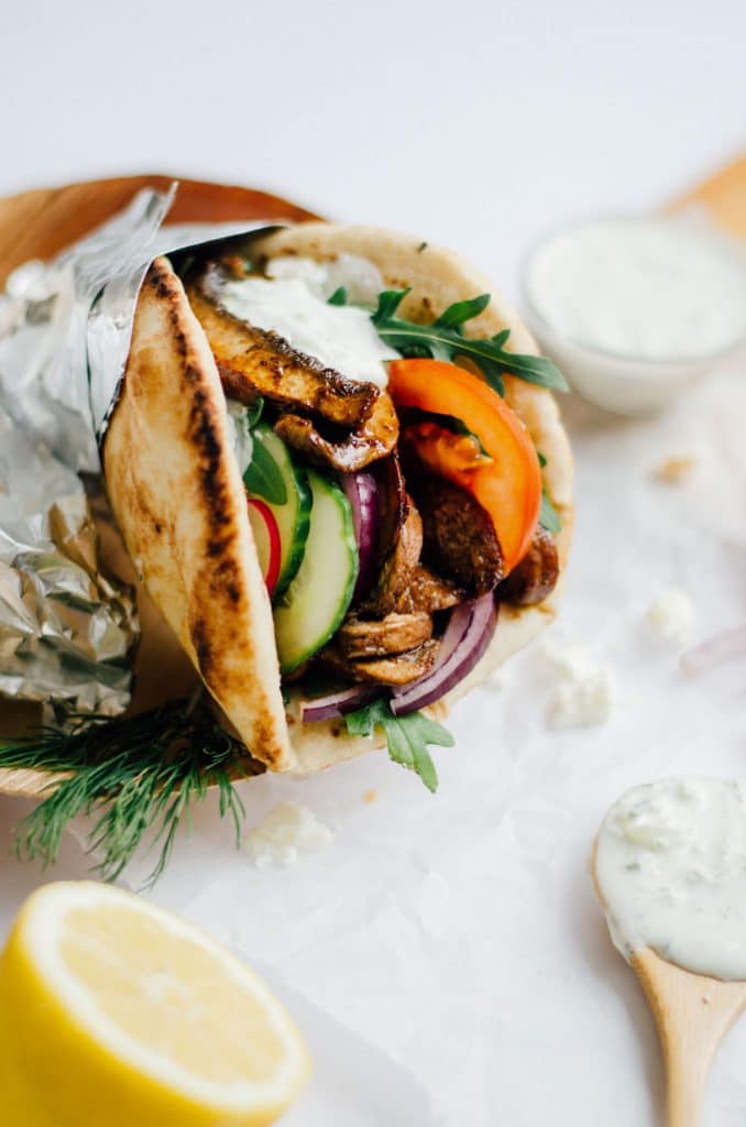 These vegetarian Portobello Mushroom Gyros are seasoned with a flavorful blend of Mediterranean spices and grilled to meaty perfection, then drizzled with a quick homemade feta tzatziki and wrapped in pillowy pita (oh, and all in under 15 minutes).