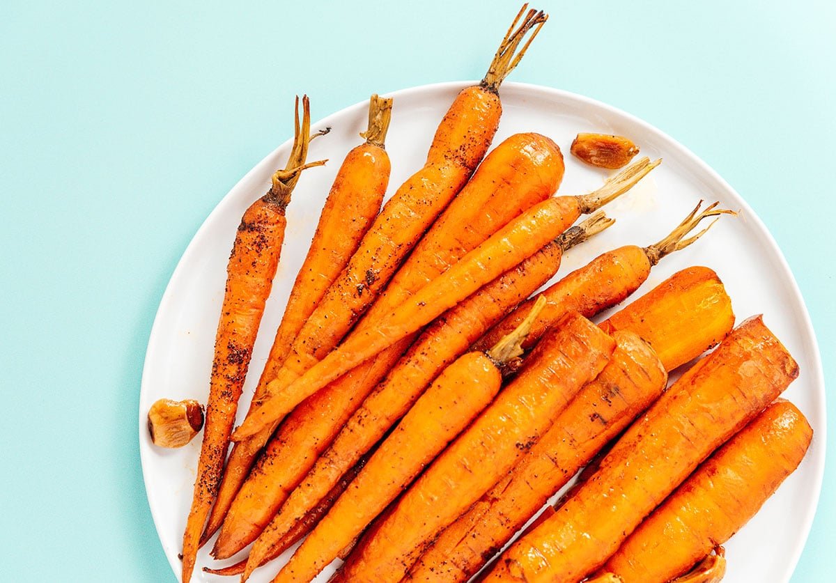 A white plate filled with slow cooker carrots