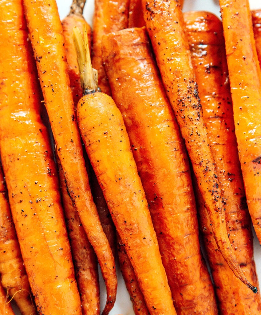 An up close view detailing the texture of slow cooker carrots