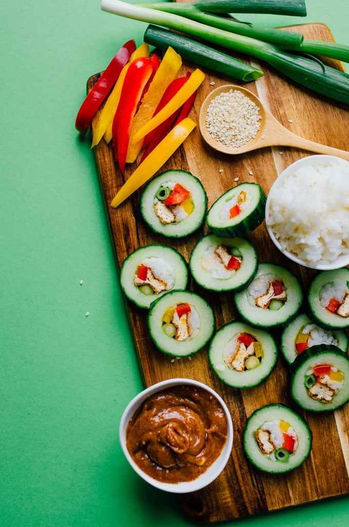 These refreshingly simple stuffed Cucumber Sushi Rolls are stuffed with crispy baked tofu and all your favorite vegetarian sushi fillings. Served with our all-time favorite almond butter dipping sauce!
