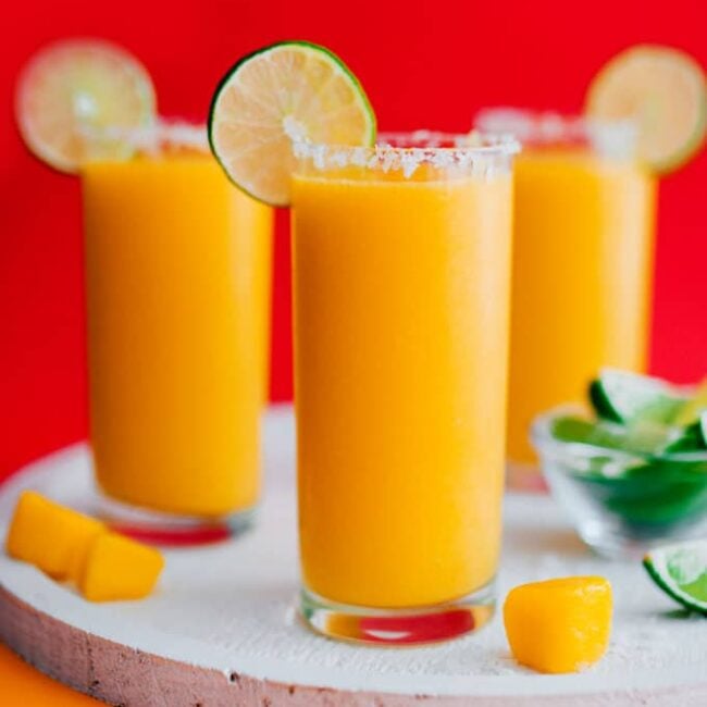 Whether you’re in need or a slushy cocktail or are just trying to clean out the freezer, this Frozen Mango Margarita Slush is the refreshing cocktail you need.