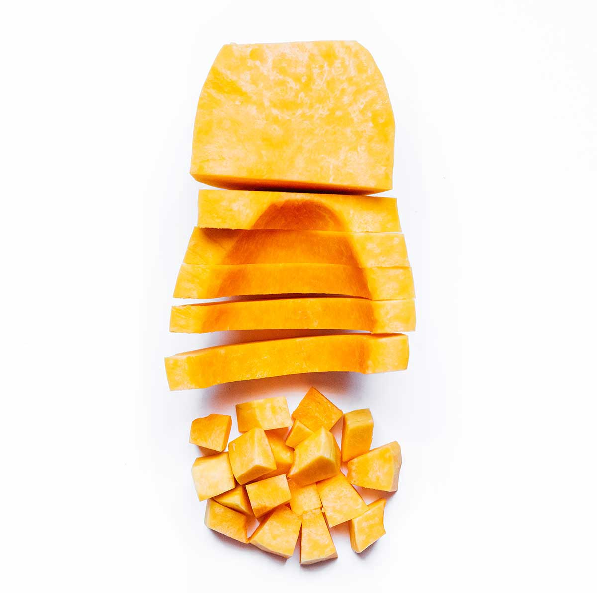 How to cut a butternut squash on a white background