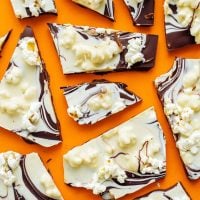 Tis the season for giving food as gifts! And if there’s one unique and delicious gift you should give this holiday season, it’s this Healthy Chocolate Bark with Salted Popcorn.