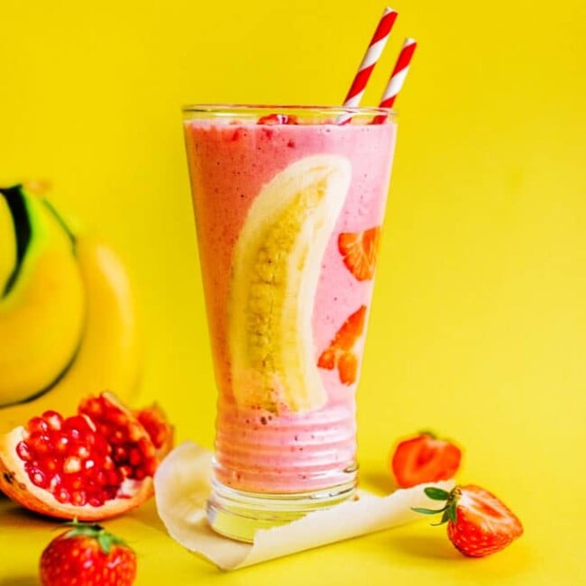 A quick and healthy Strawberry Pomegranate Smoothie, made ultra-creamy with yogurt and bananas and made frosty with frozen fruit. 