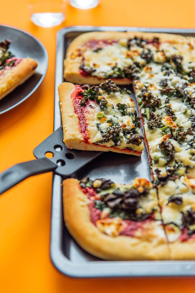 Step up your pizza game with this Beet Pesto Pizza with Goat Cheese and Kale, a decadent, healthy pizza that's packed with flavor and antioxidants.