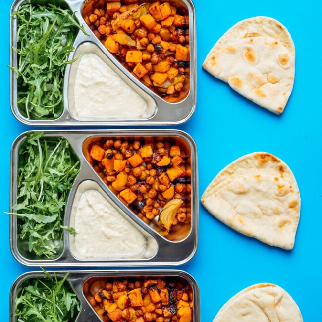 This Butternut Bowl Meal Prep is packed with spiced roasted chickpeas and butternut, drizzle with lemony hummus sauce, and is totally vegan!