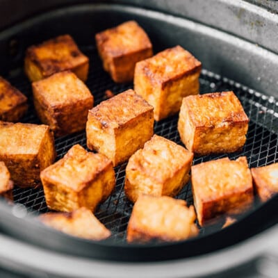 Blocks of tofu in the air fryer.