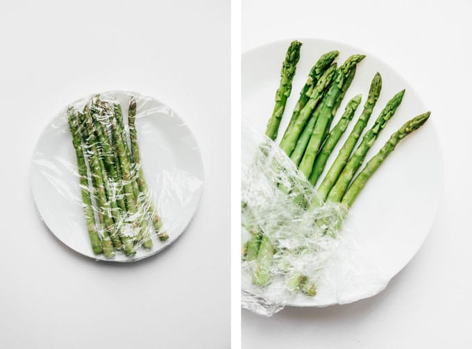 Microwaved asparagus recipe on white background - The ultimate guide on how to cook asparagus! How to cook asparagus in the oven, in the microwave, or by blanching, steaming, or sautéing.