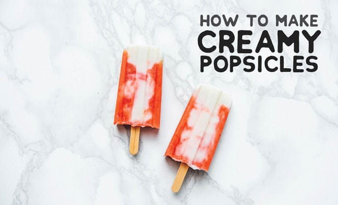 Healthy homemade popsicles recipe photo on a marble background