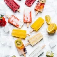 Healthy homemade popsicles recipe photo on a marble background