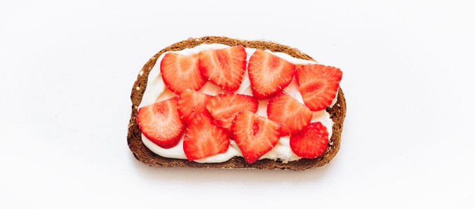 Healthy toast with greek yogurt and strawberries