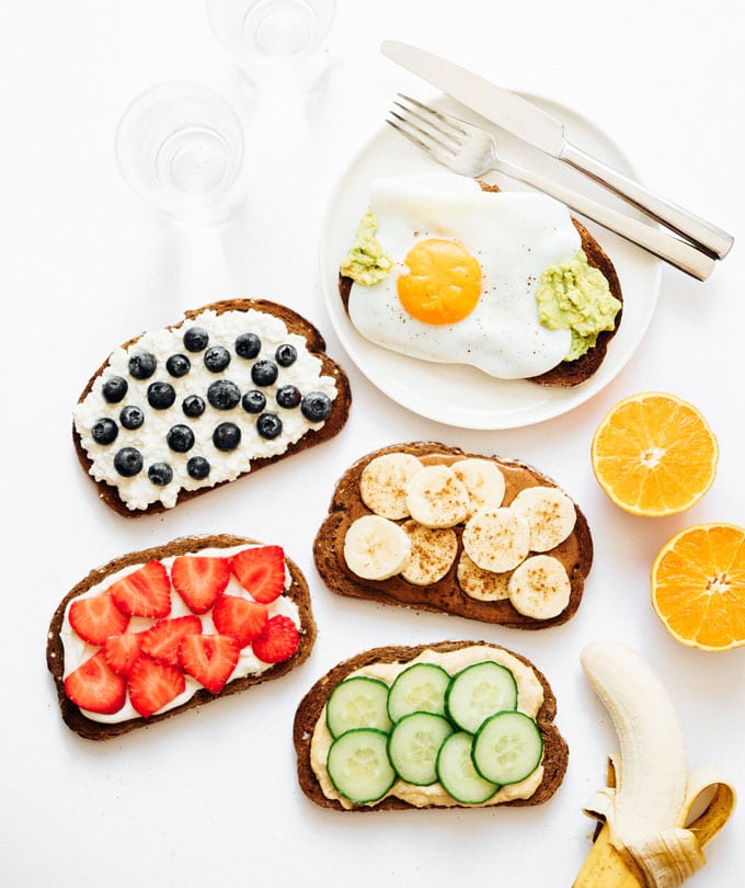 Healthy toast topping ideas on white background