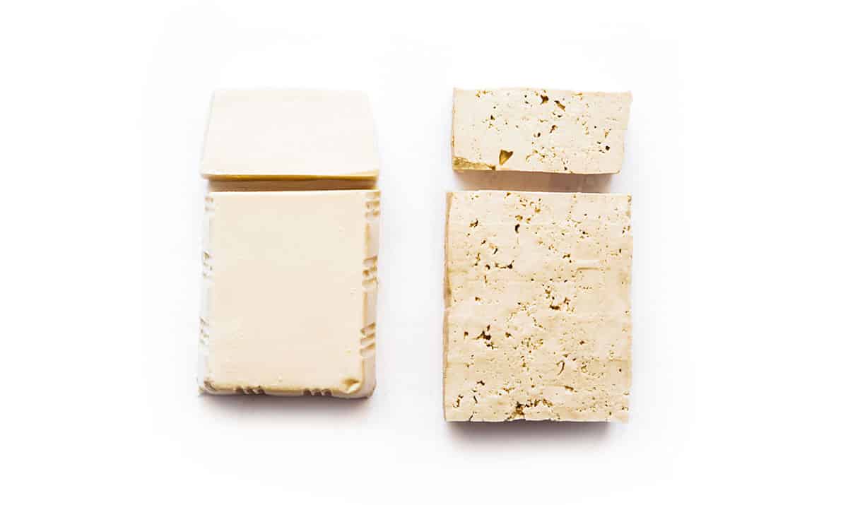 Two types of tofu on a white background
